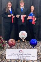 Pictured, from left, Missouri 4-H dairy judging team members Molly Archer, Case Melzer and Libby Shaver showing their awards from the All-American Dairy Show Invitational Youth Dairy Cattle Judging Contest in Harrisburg, Pa.