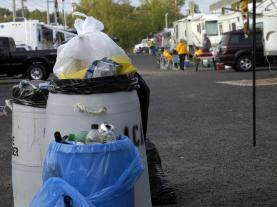 MU hands out blue bags to tailgaters to encourage recycling of metal, glass and plastic refuse. Curt Wohleber/MU Cooperative Media Group